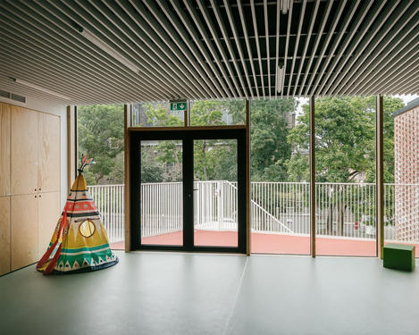 Indoor activity room on the same level with its terrace.